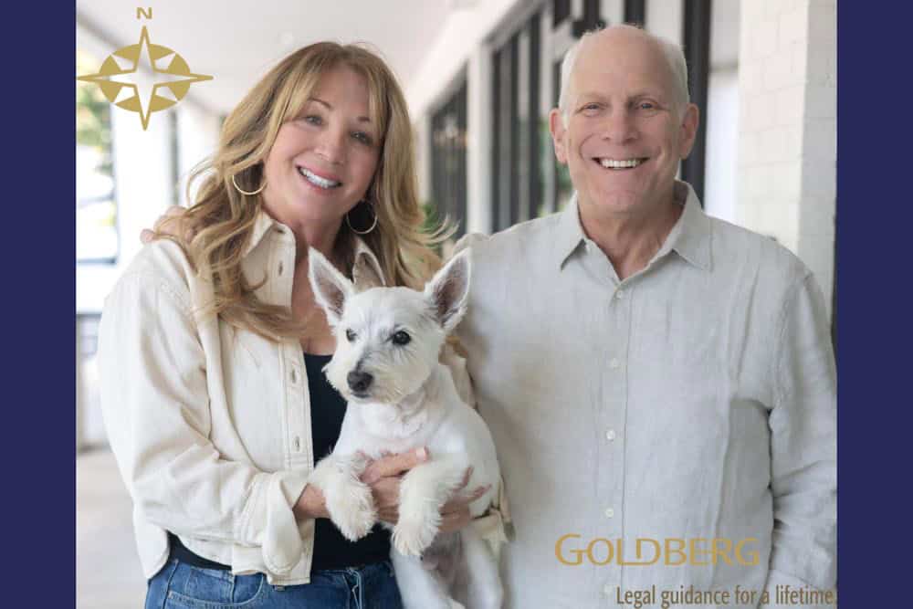 Bob and Kimberley Goldberg with their dog Henri